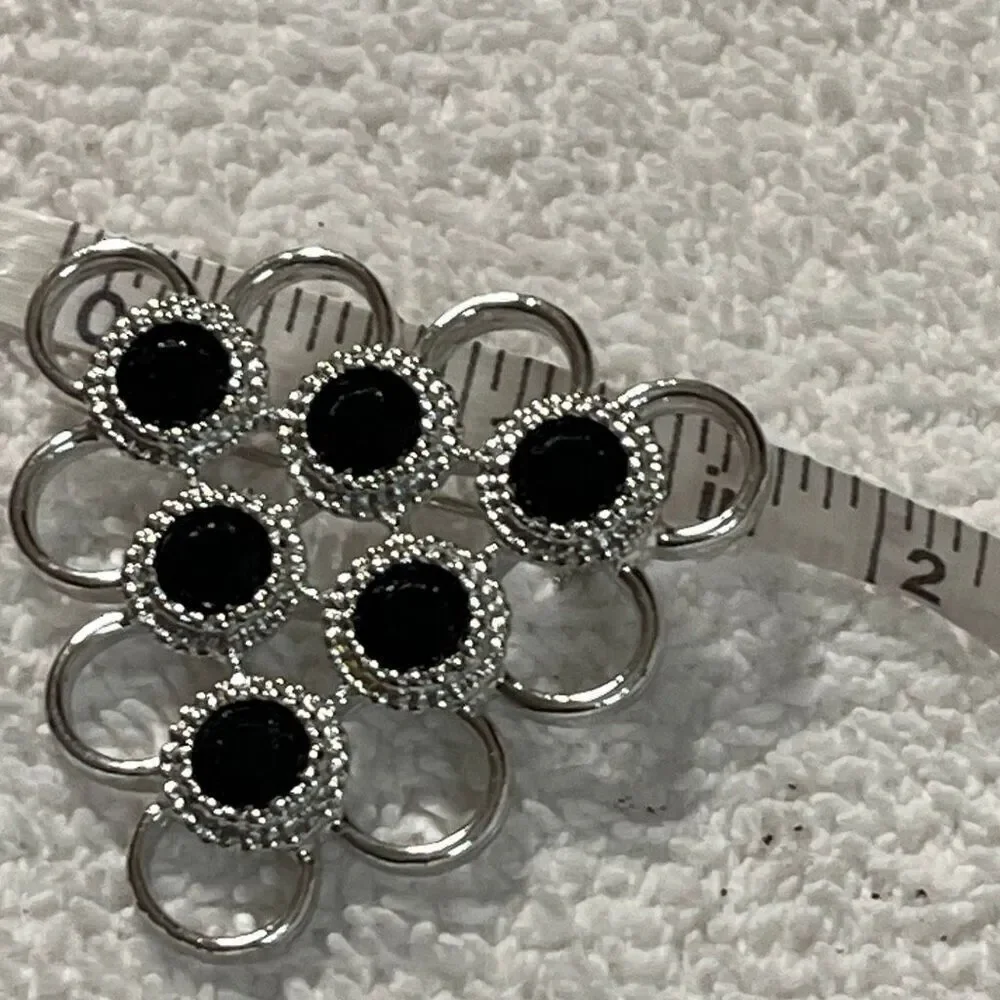 Vintage Sarah Coventry triangle open design black glass brooch